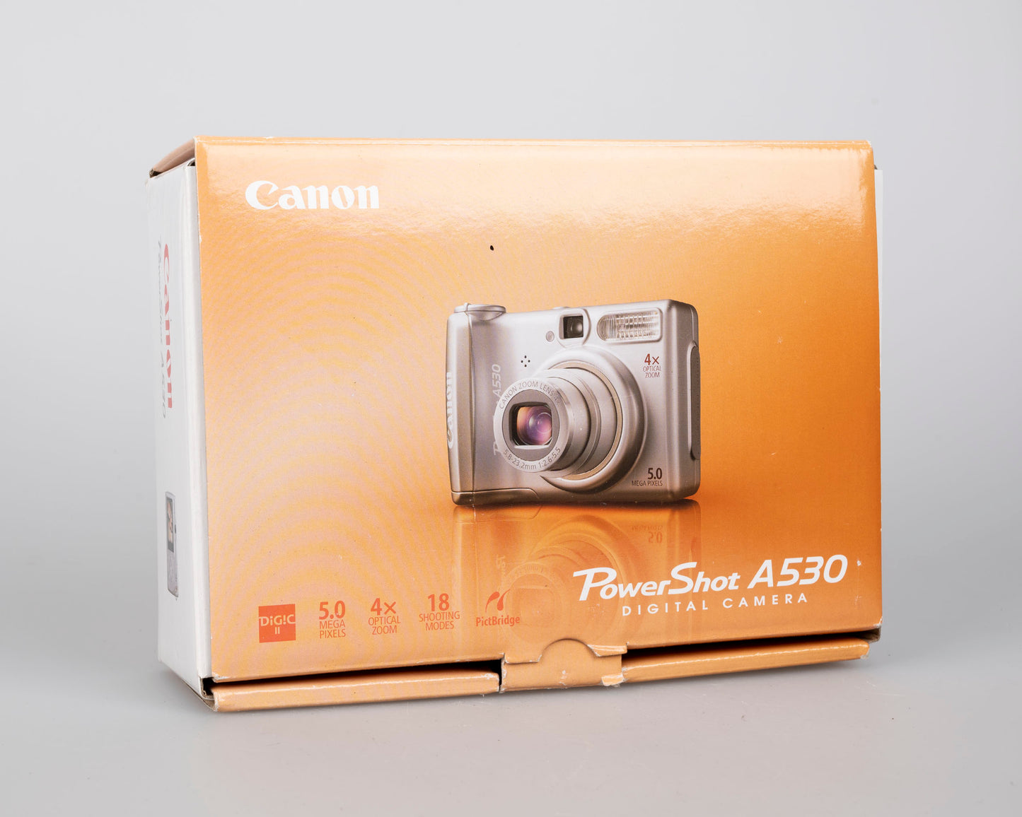 Canon Powershot A530 digicam w/ 5 MP CCD sensor; includes 512MB SD card (uses AA batteries) + original box & manual