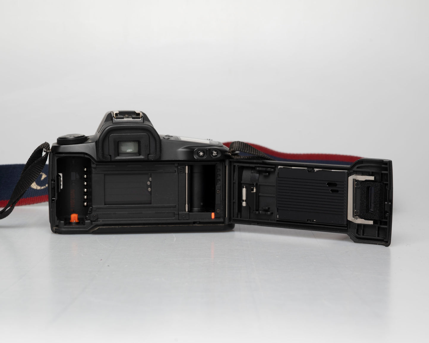 Canon EOS Rebel G 35mm film SLR w/ Sigma EF 35-80mm lens (serial 1408276)