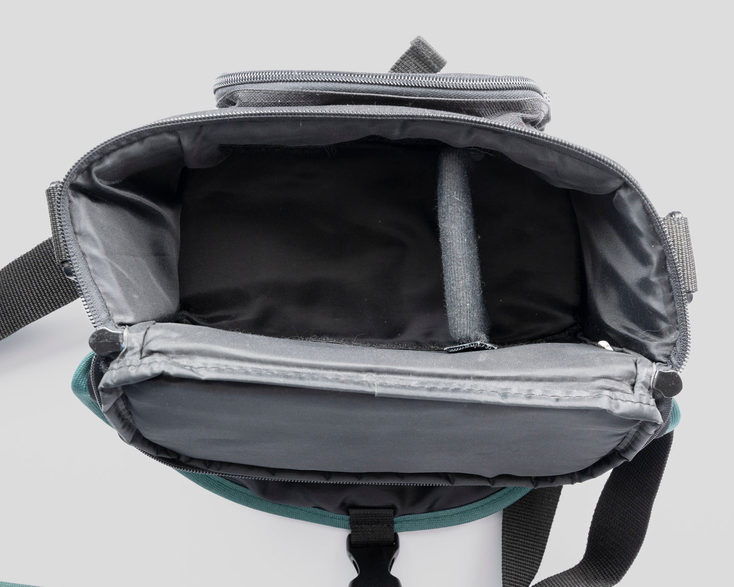 Canon black and green mid-sized camera shoulder bag