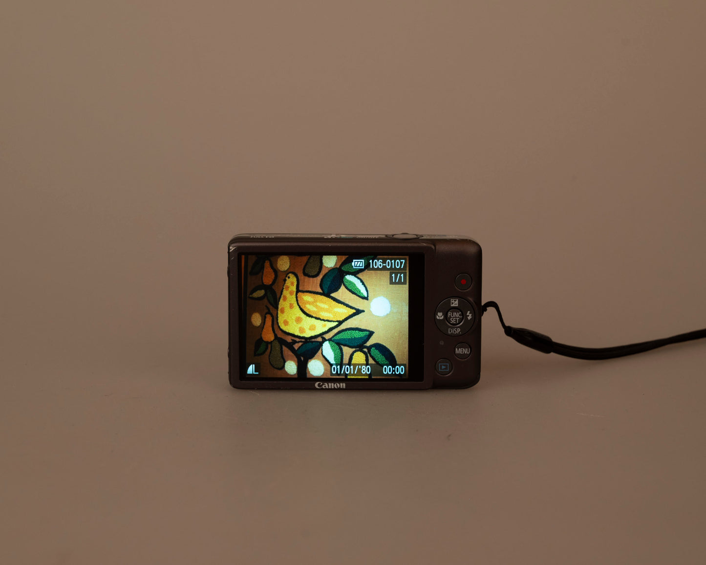 Canon Powershot Digital Elph 100 HS 12.1MP digicam w/ 8GB SD card + battery + charger