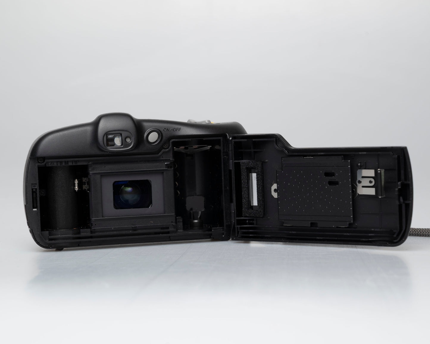 Minolta Freedom Action Zoom appareil photo 35mm *moteur bruyant* (série 93374092)