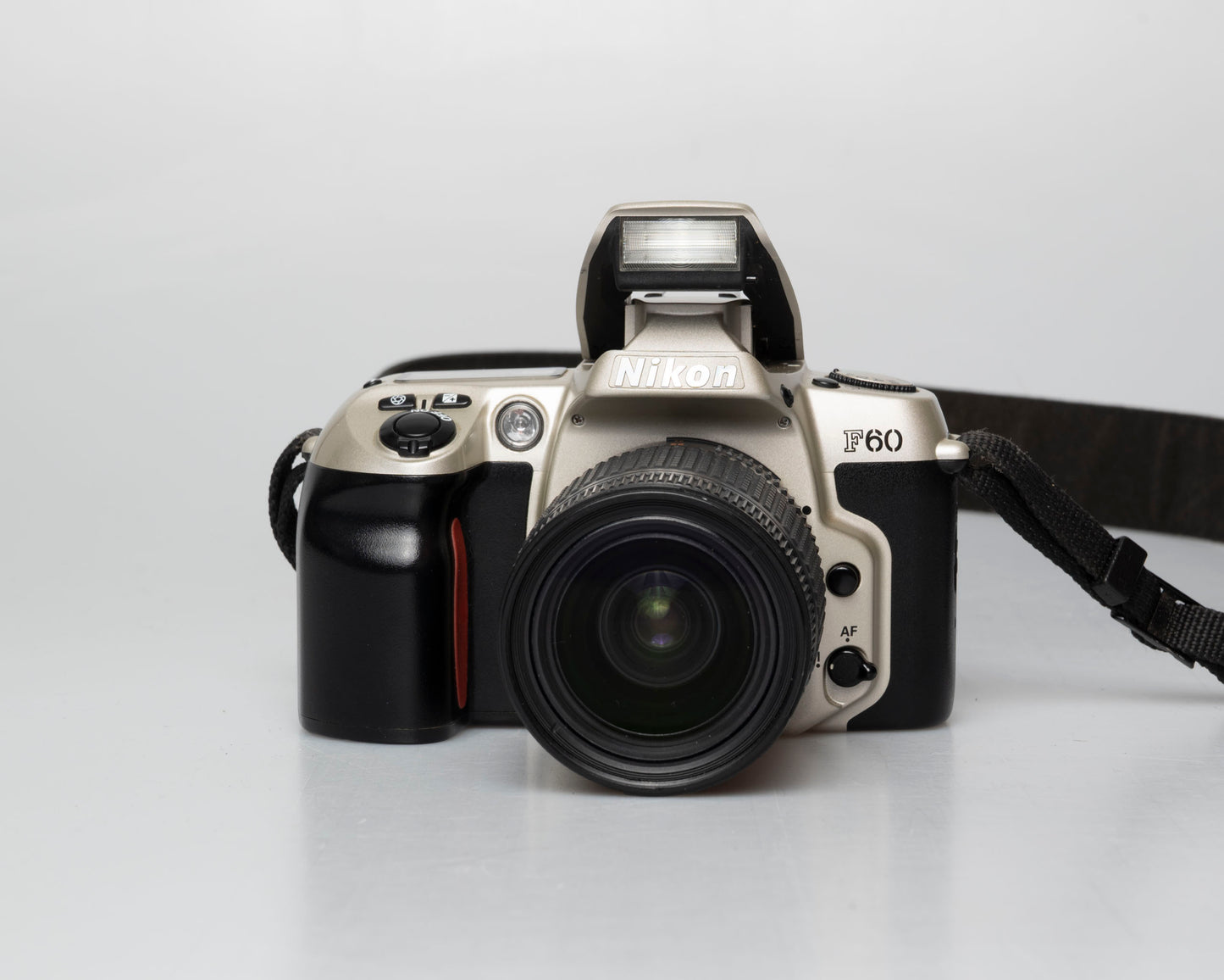 Nikon F60 35mm film SLR w/ AF Nikkor 28-80mm lens + manual (serial 2417905)