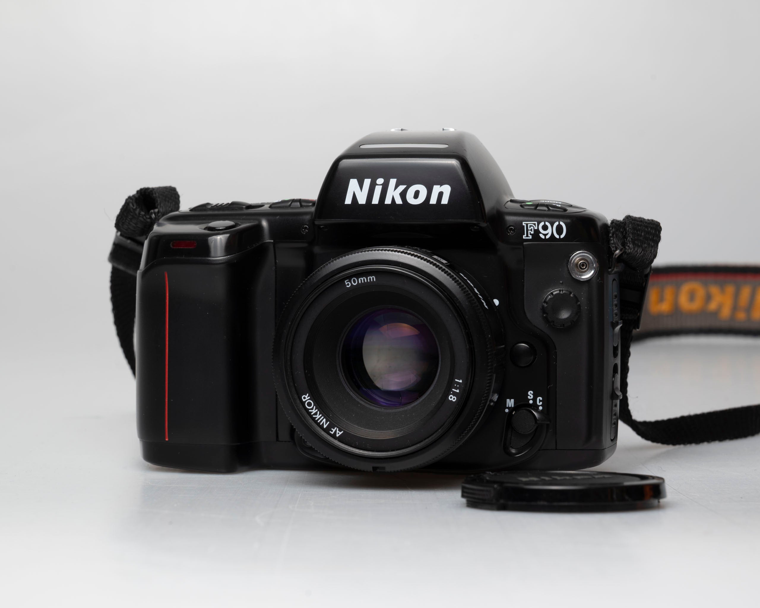 Nikon F90 35mm film SLR w/ AF Nikkor 50mm f1.8 lens (serial