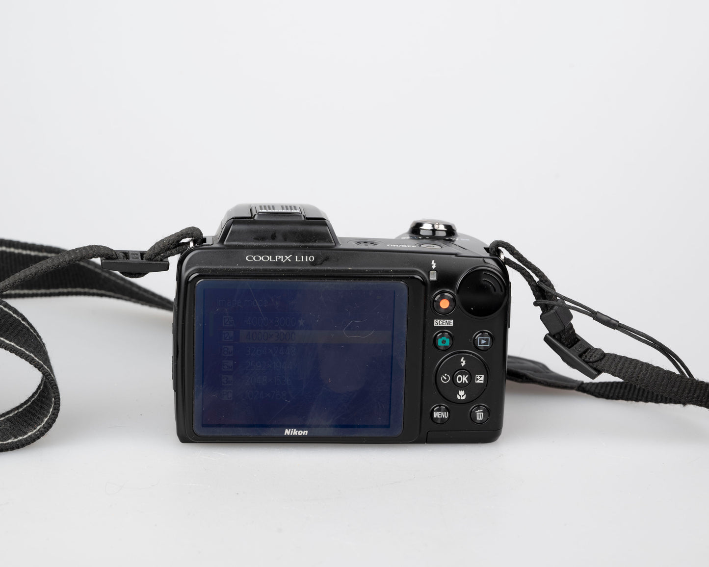 Nikon Coolpix L100 12.1 MP CCD sensor digicam (uses AA batteries + SD card)