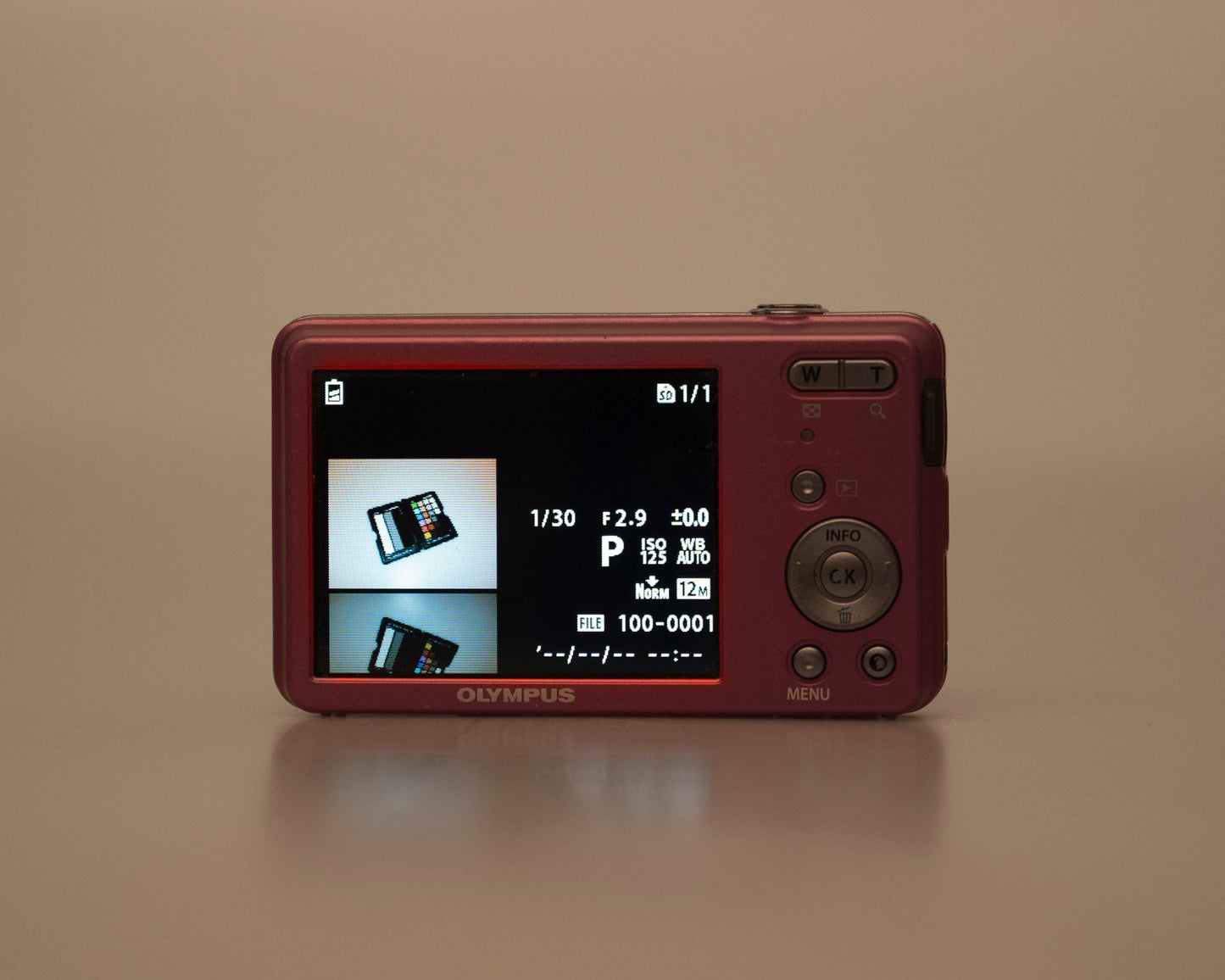 Olympus VG-110 12MP digicam w/ 8GB SD card + battery + charger (serial UJB001451)