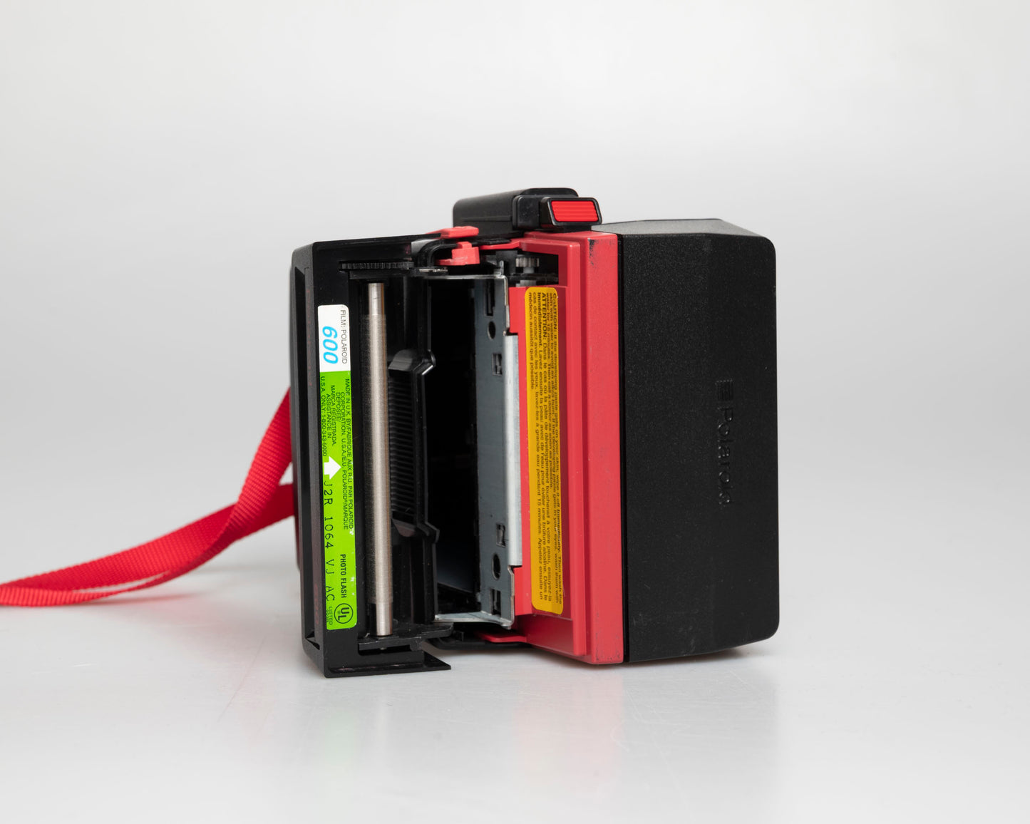 Red Polaroid 600 Cool Cam instant camera (serial J2R1064VJAC)