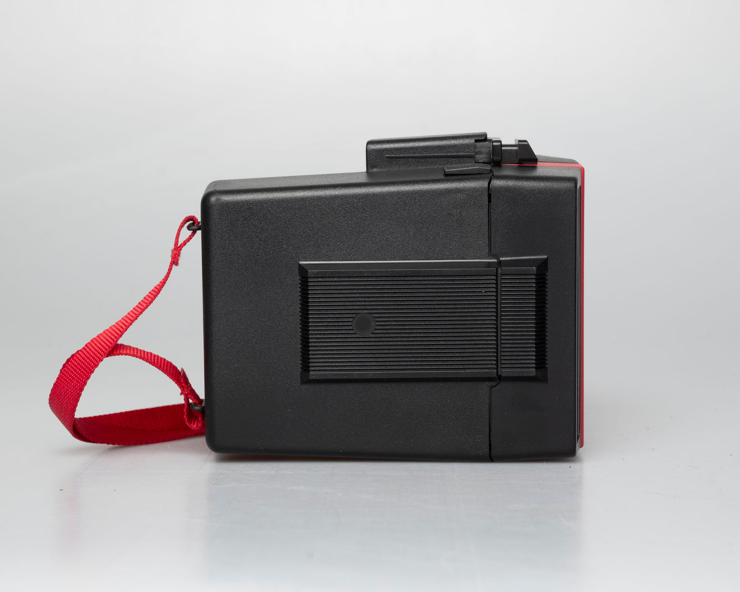 Red Polaroid 600 Cool Cam instant camera w/ matching backpack tote + manual (serial D899687VE)