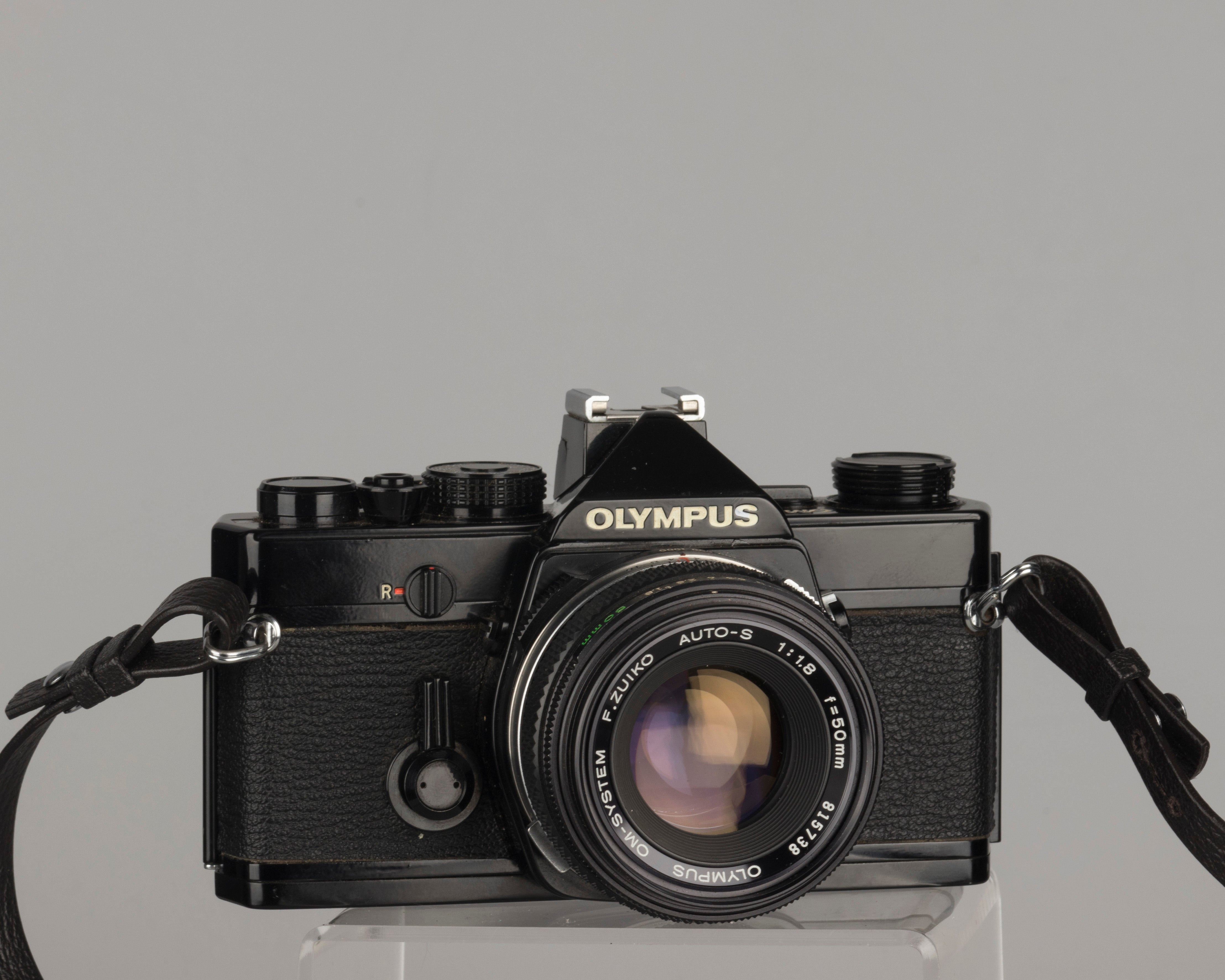 Olympus OM-1 35mm film SLR w/ Zuiko 50mm f1.8 lens and ever-ready