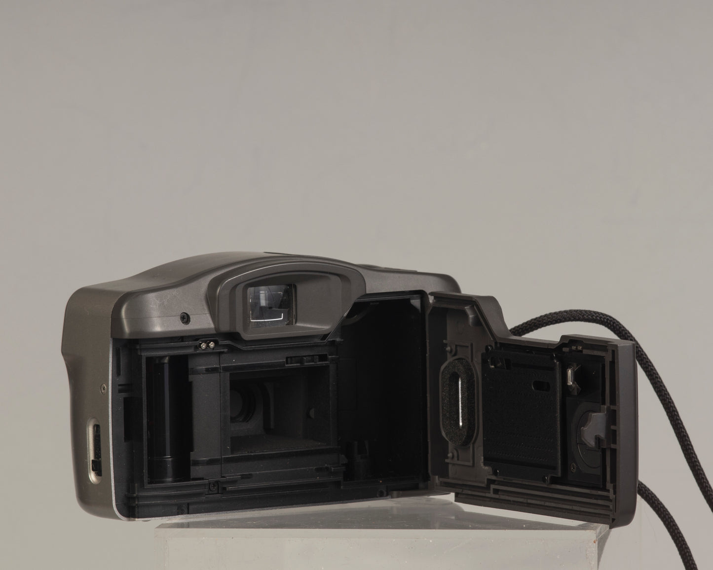 Canon Sure Shot Owl PF Date (film door): a point-and-shoot 35mm film camera with a 35mm f/3.8 lens