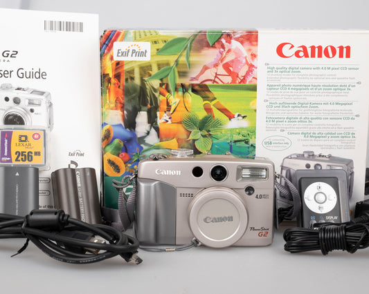 Canon Powershot G2 digicam w/ 4 MP CCD sensor; includes 256MB CF card + 2 batteries w/ charger + original box, manuals & accessories