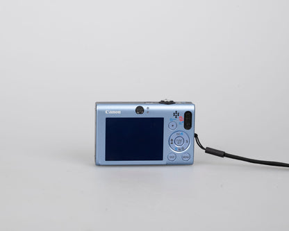 Appareil photo numérique Canon Powershot SD1100 IS Digital Elph 8MP CCD avec carte SD 2 Go + batteries + chargeur + boîte d'origine + étui