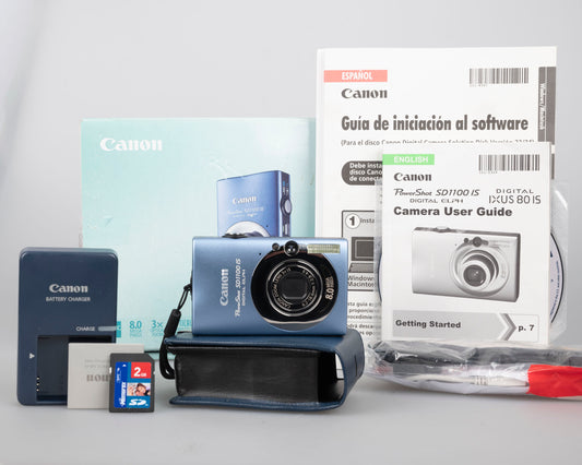 Canon Powershot SD1100 IS Digital Elph 8MP CCD digicam w/ 2GB SD card + batteries + charger + original box + case