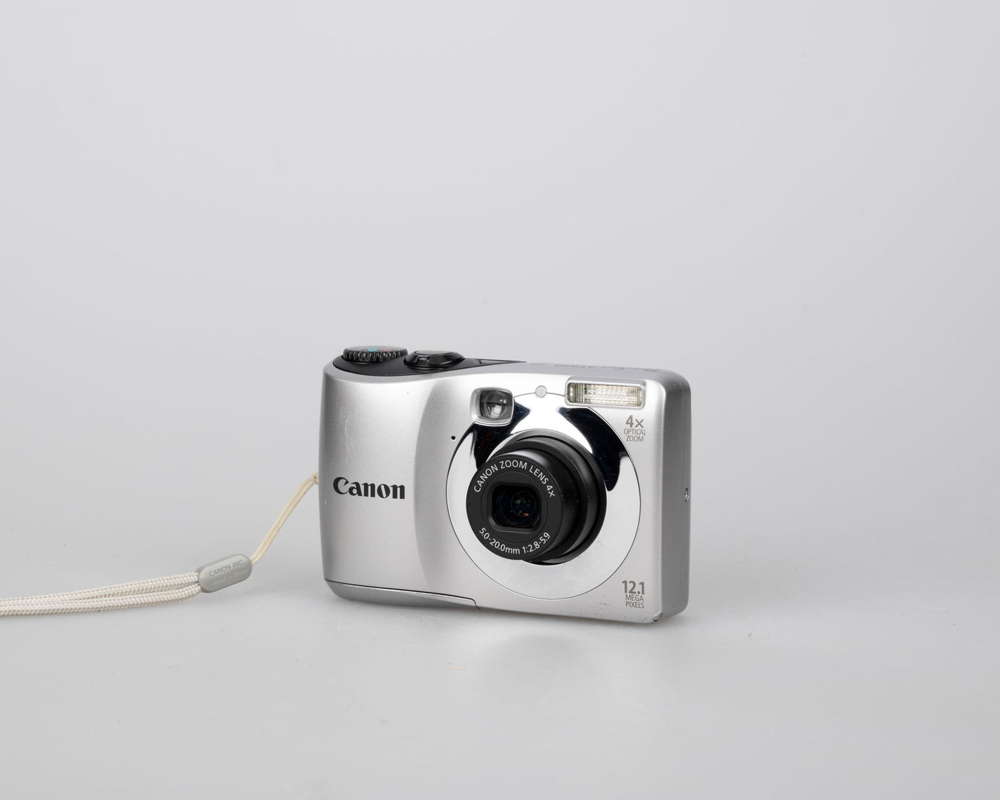 Canon Powershot A1200 digicam w/ 12 MP CCD sensor + 2 GB SD card (uses AA batteries)