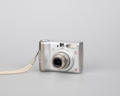 Appareil photo numérique Canon Powershot A530 avec capteur CCD 5 MP ; comprend une carte SD de 512 Mo (utilise des piles AA) + la boîte d'origine et le manuel