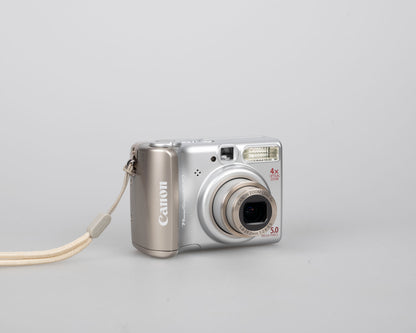 Canon Powershot A530 digicam w/ 5 MP CCD sensor; includes 512MB SD card (uses AA batteries) + original box & manual