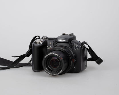 Appareil photo numérique Canon Powershot S5 IS avec capteur CCD 8 MP + carte SD 4 Go (utilise des piles AA)