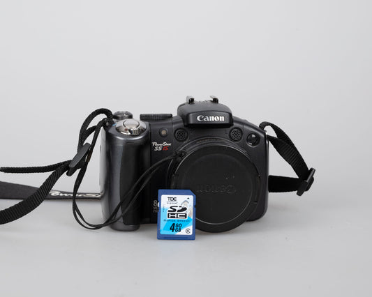 Canon Powershot S5 IS digicam w/ 8 MP CCD sensor + 4 GB SD card (uses AA batteries)