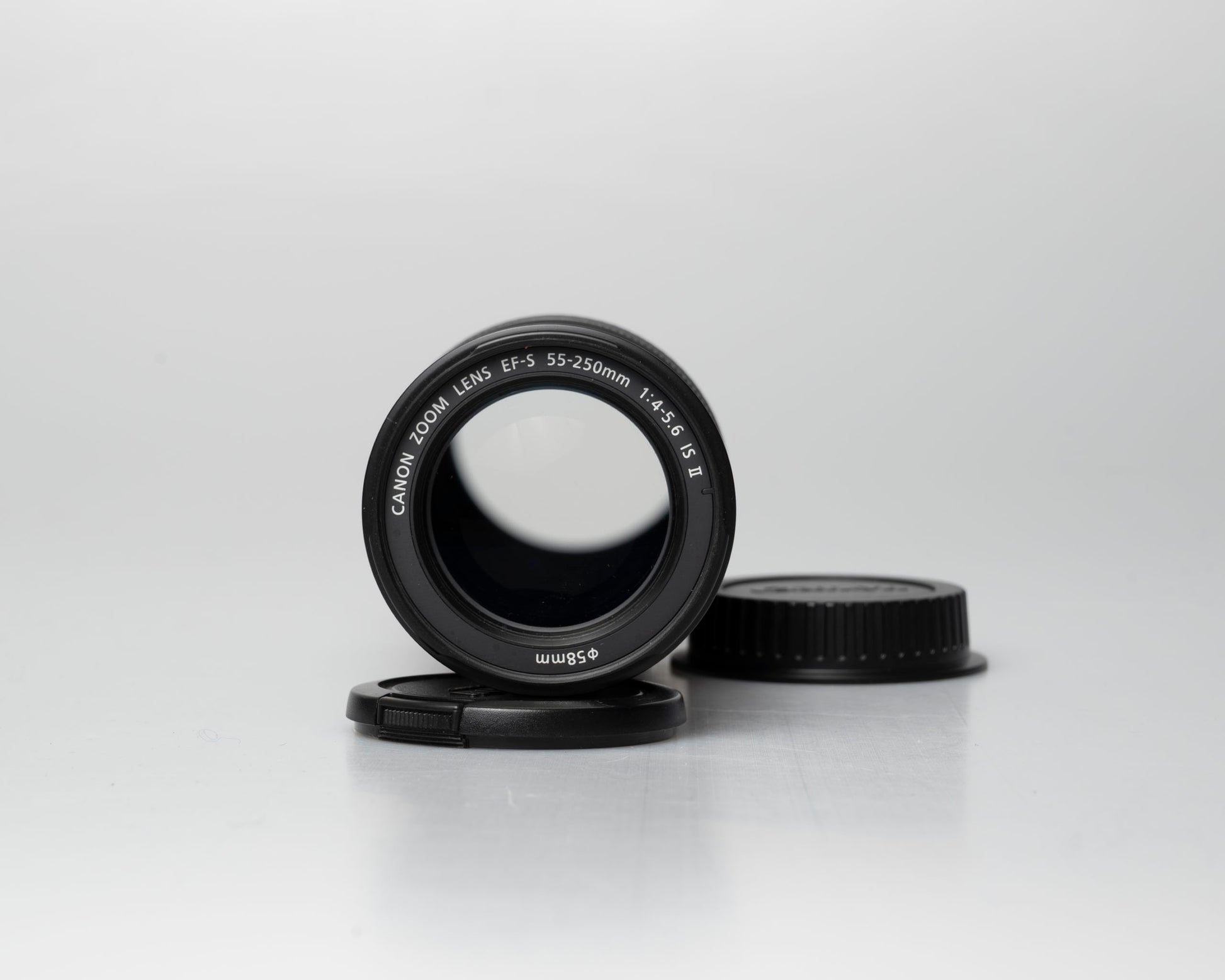 Canon EF-S 55-250mm f/4-5.6 IS II lens, front view with front and back caps off