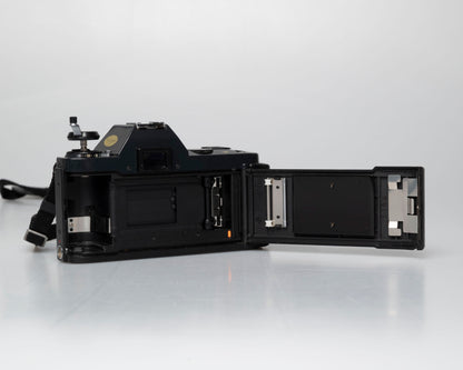 Canon T50 35mm film SLR camera w/FD 50mm f1.8 lens (serial 1316532)