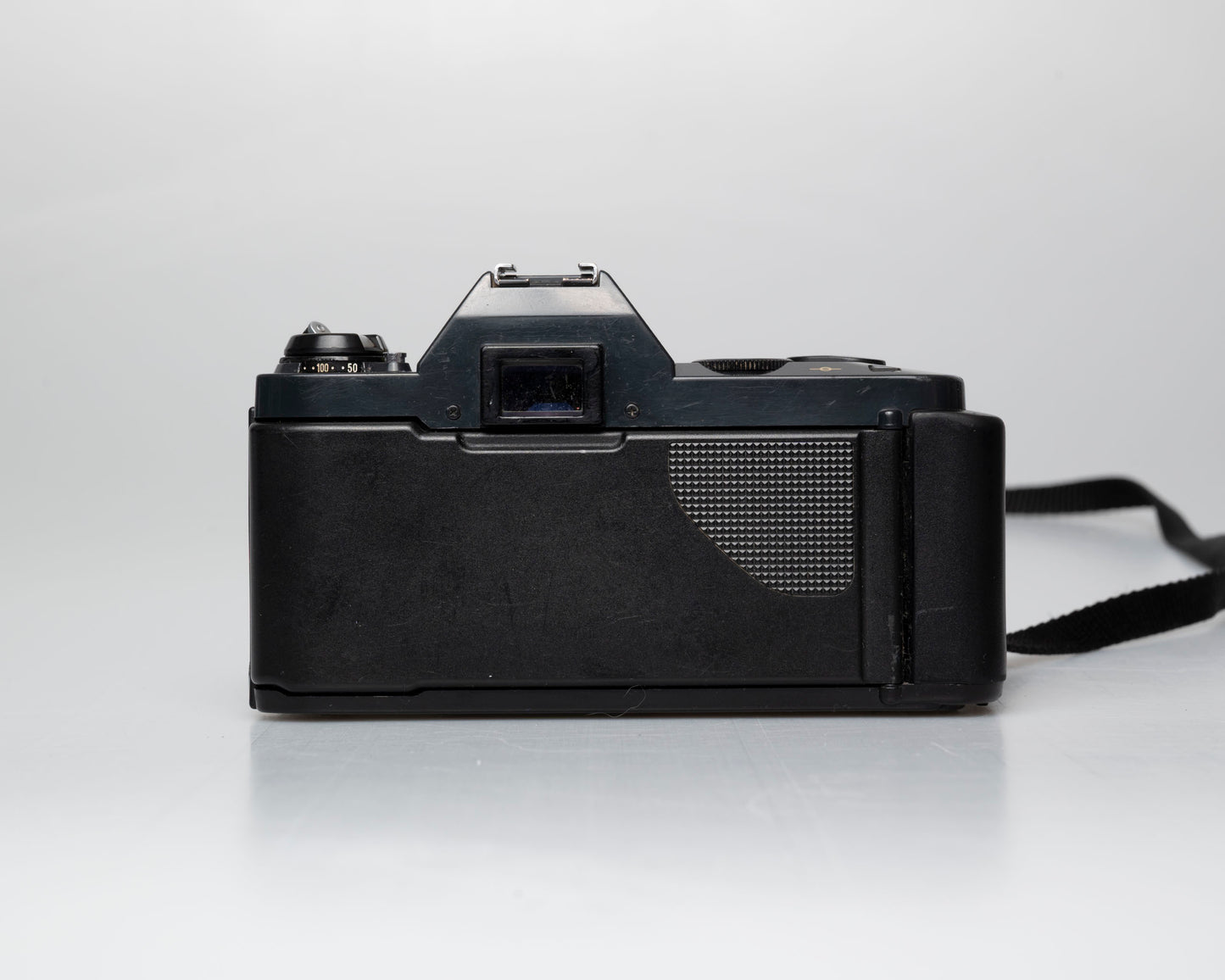 Canon T50 35mm film SLR camera w/FD 50mm f1.8 lens (serial 1316532)