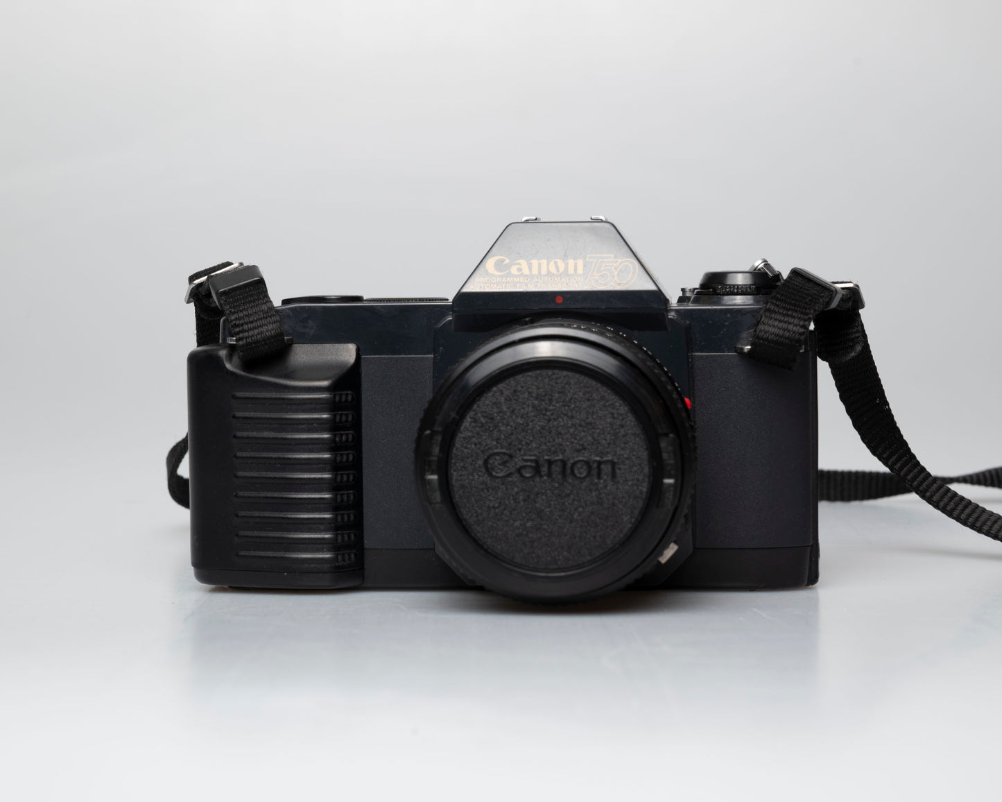 Canon T50 35mm film SLR camera w/FD 50mm f1.8 lens (serial 1316532)