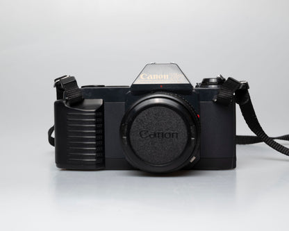 Canon T50 35mm film SLR camera w/FD 50mm f1.8 lens (serial 1316532)