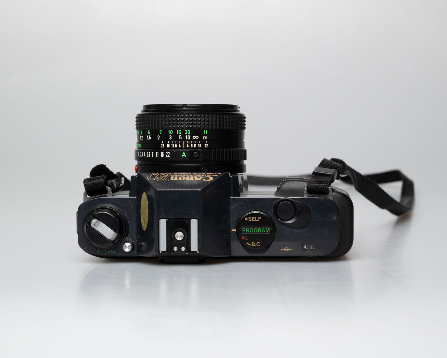 Canon T50 35mm film SLR camera w/FD 50mm f1.8 lens (serial 1316532)