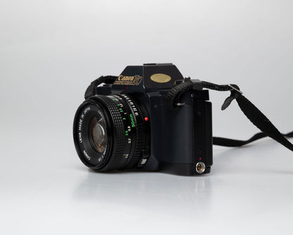 Canon T50 35mm film SLR camera w/FD 50mm f1.8 lens (serial 1316532)