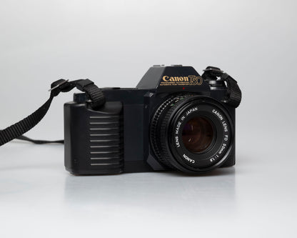 Canon T50 35mm film SLR camera w/FD 50mm f1.8 lens (serial 1316532)