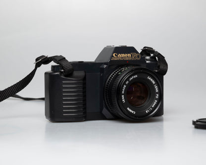 Canon T50 35mm film SLR camera w/FD 50mm f1.8 lens (serial 1316532)