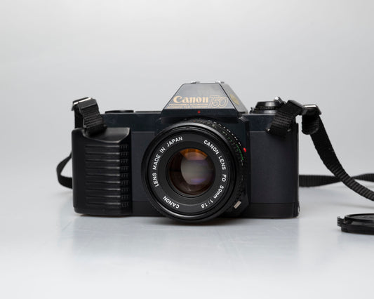 Canon T50 35mm film SLR camera w/FD 50mm f1.8 lens (serial 1316532)