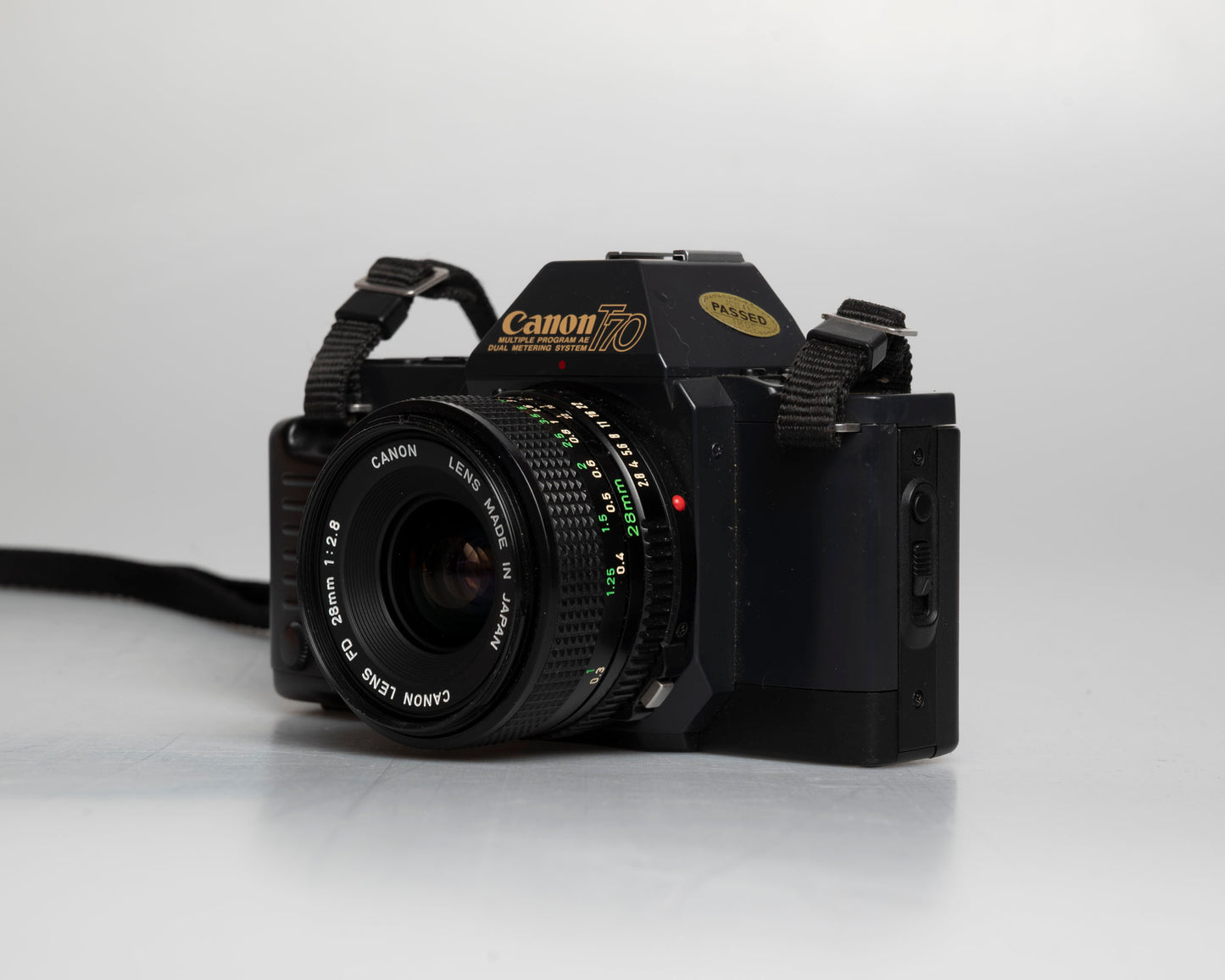 Canon T70 35mm SLR with FD 28mm f2.8 lens (serial 1026627)