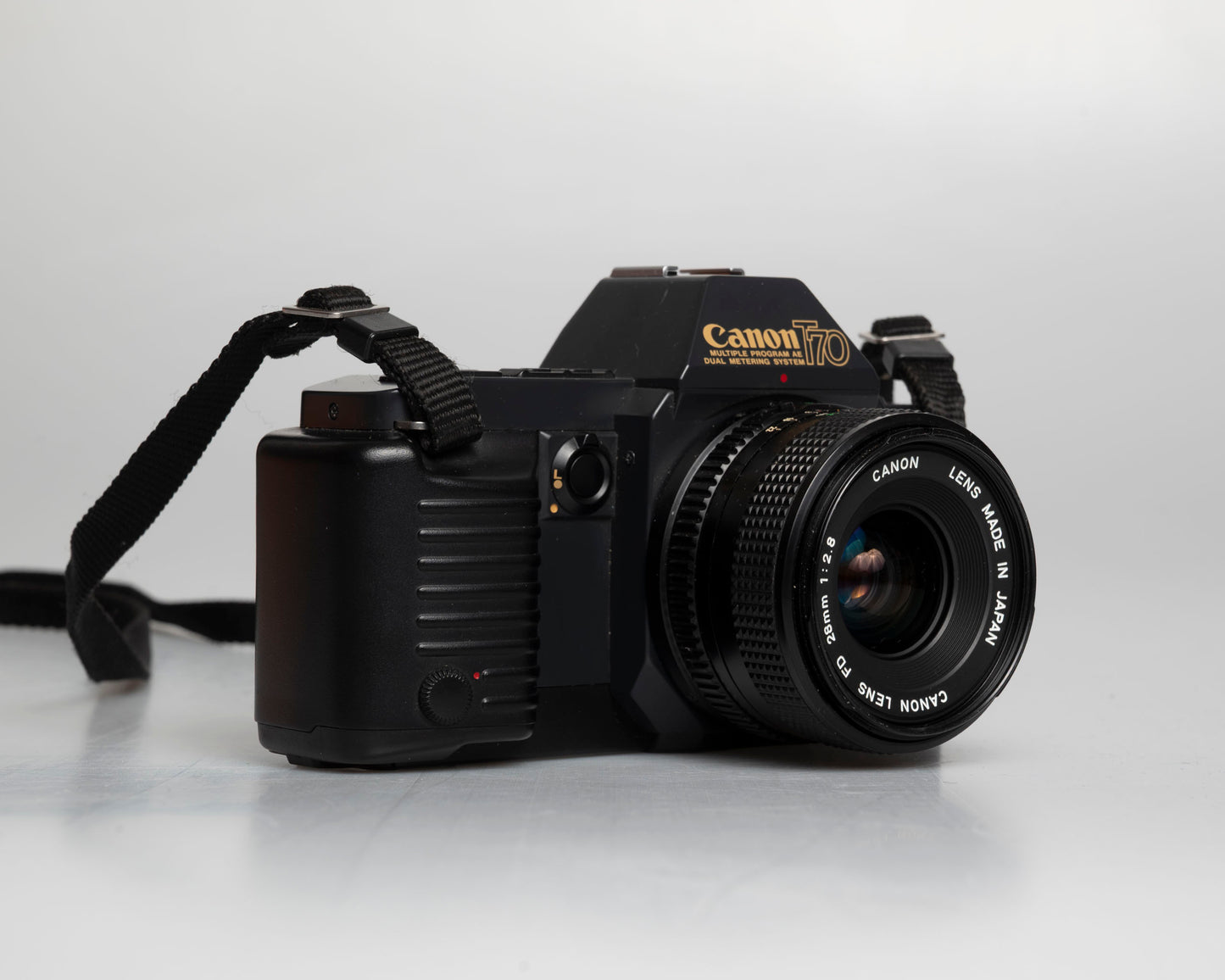Canon T70 35mm SLR with FD 28mm f2.8 lens (serial 1026627)
