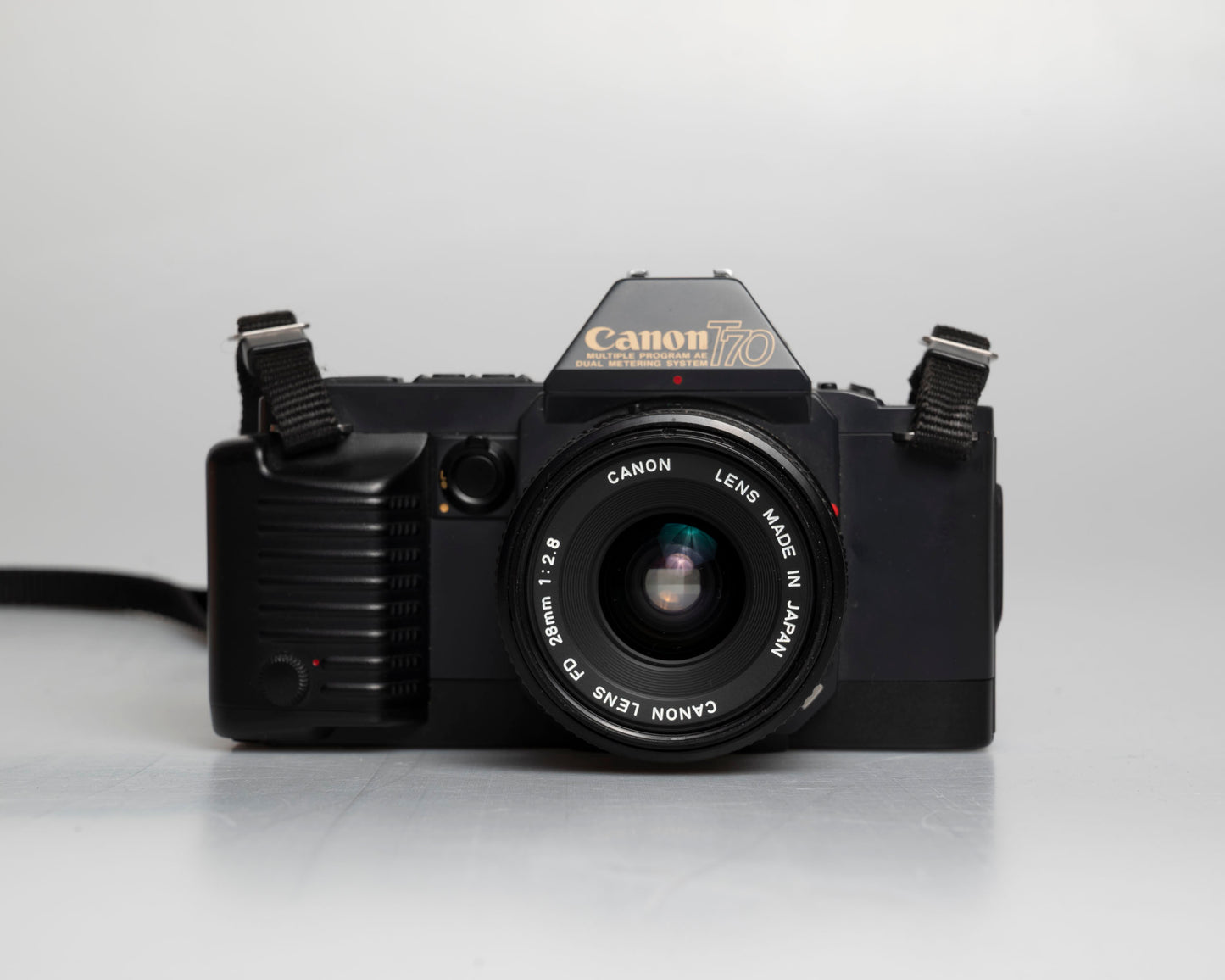Canon T70 35mm SLR with FD 28mm f2.8 lens (serial 1026627)