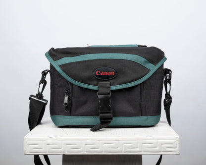 Canon black and green mid-sized camera shoulder bag