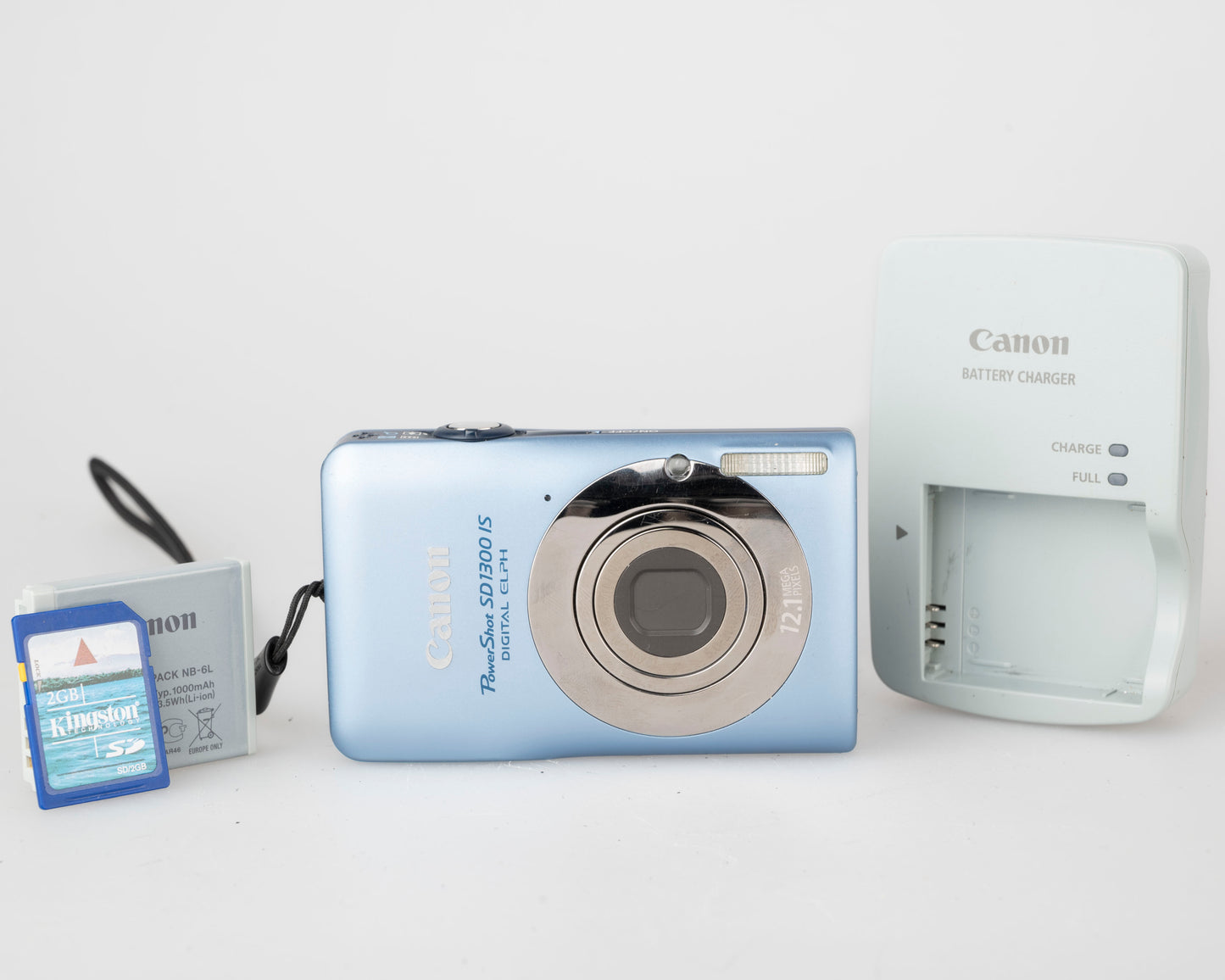 Canon Powershot SD1300 IS digicam w/ 12 MP.1 CCD sensor w/ 2GB SD card + battery + charger