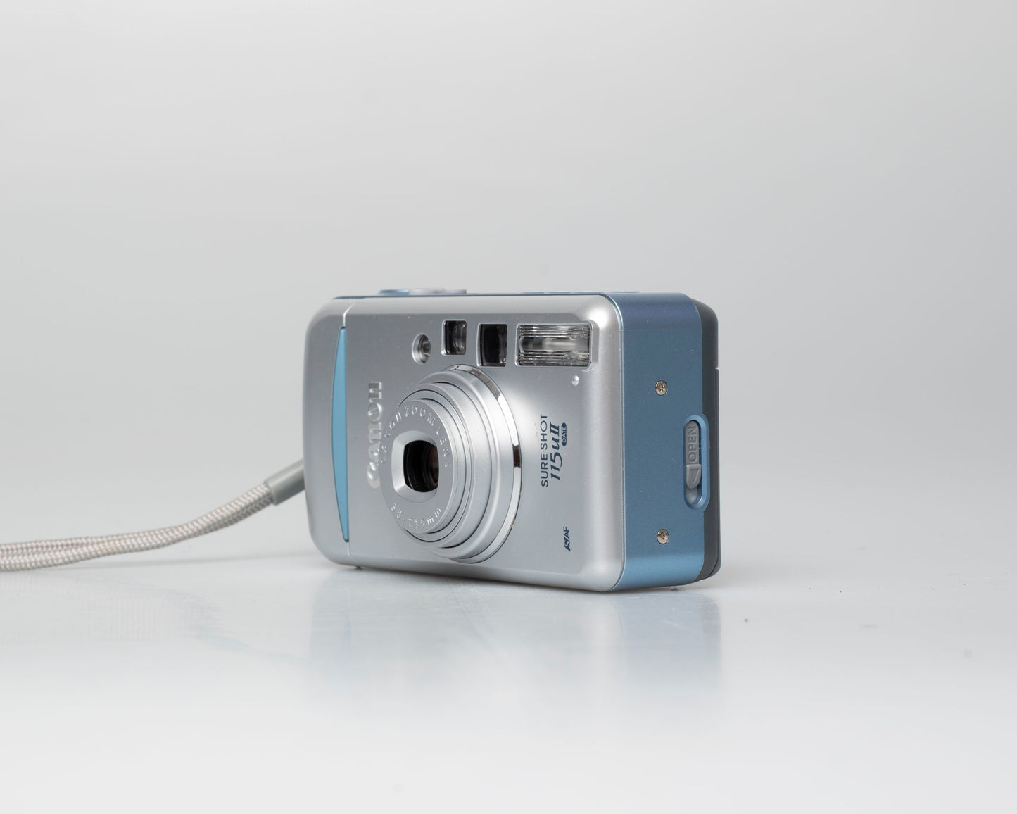 Canon Sure Shot 115u II Date appareil photo 35mm avec étui (numéro de série 1005159)