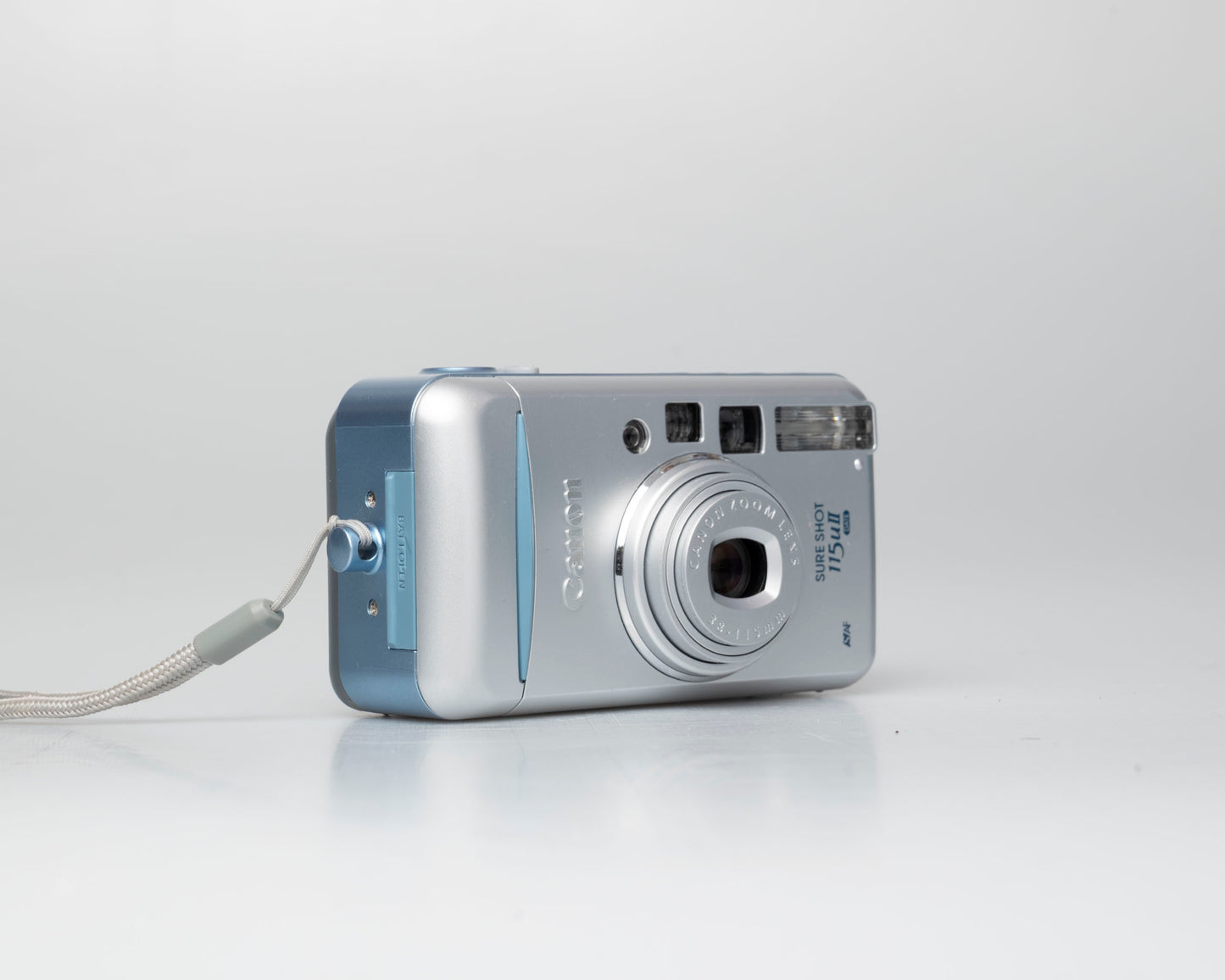 Canon Sure Shot 115u II Date appareil photo 35mm avec étui (numéro de série 1005159)