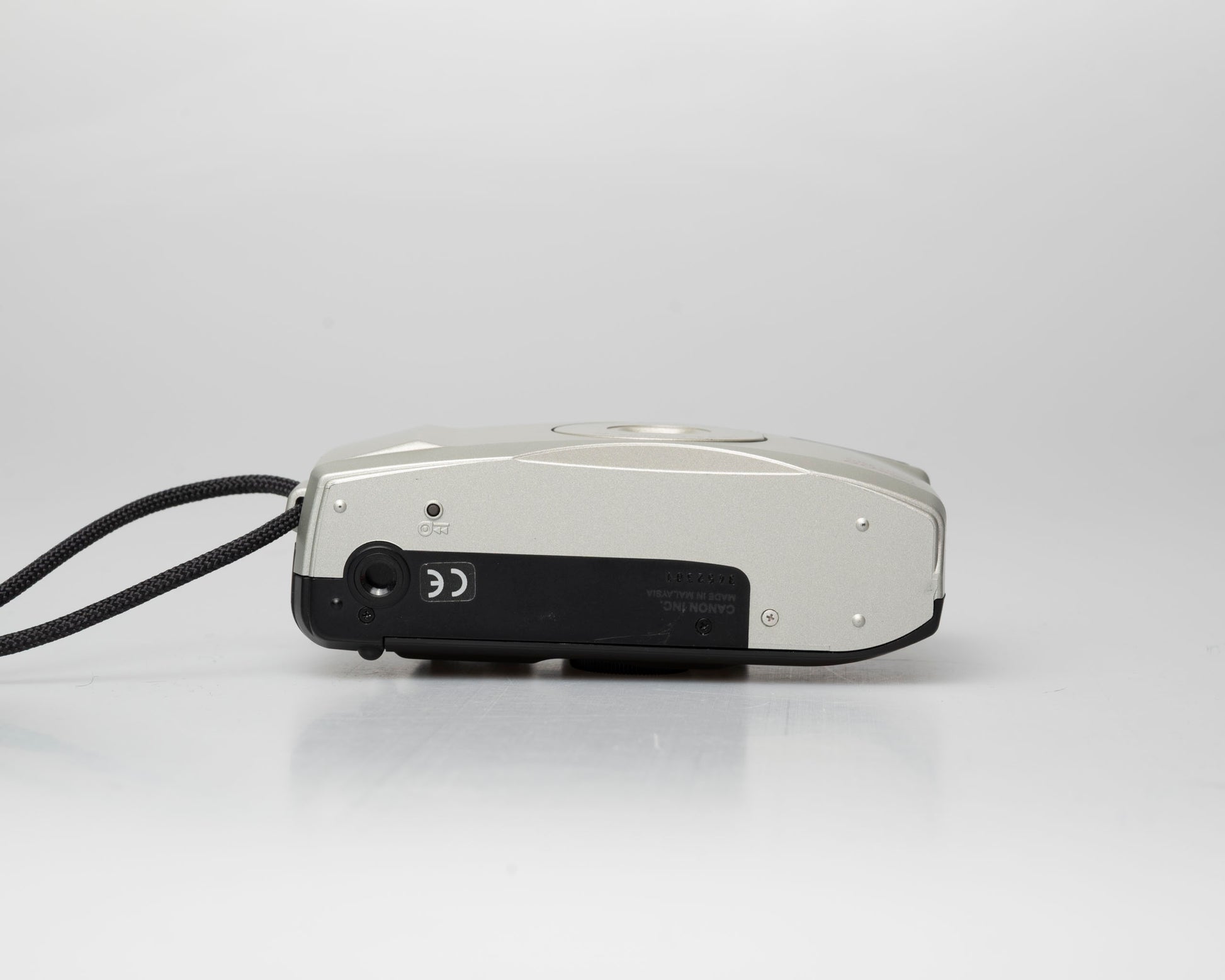 Canon Sure Shot 60 Zoom 35mm point-and-shoot camera; bottom