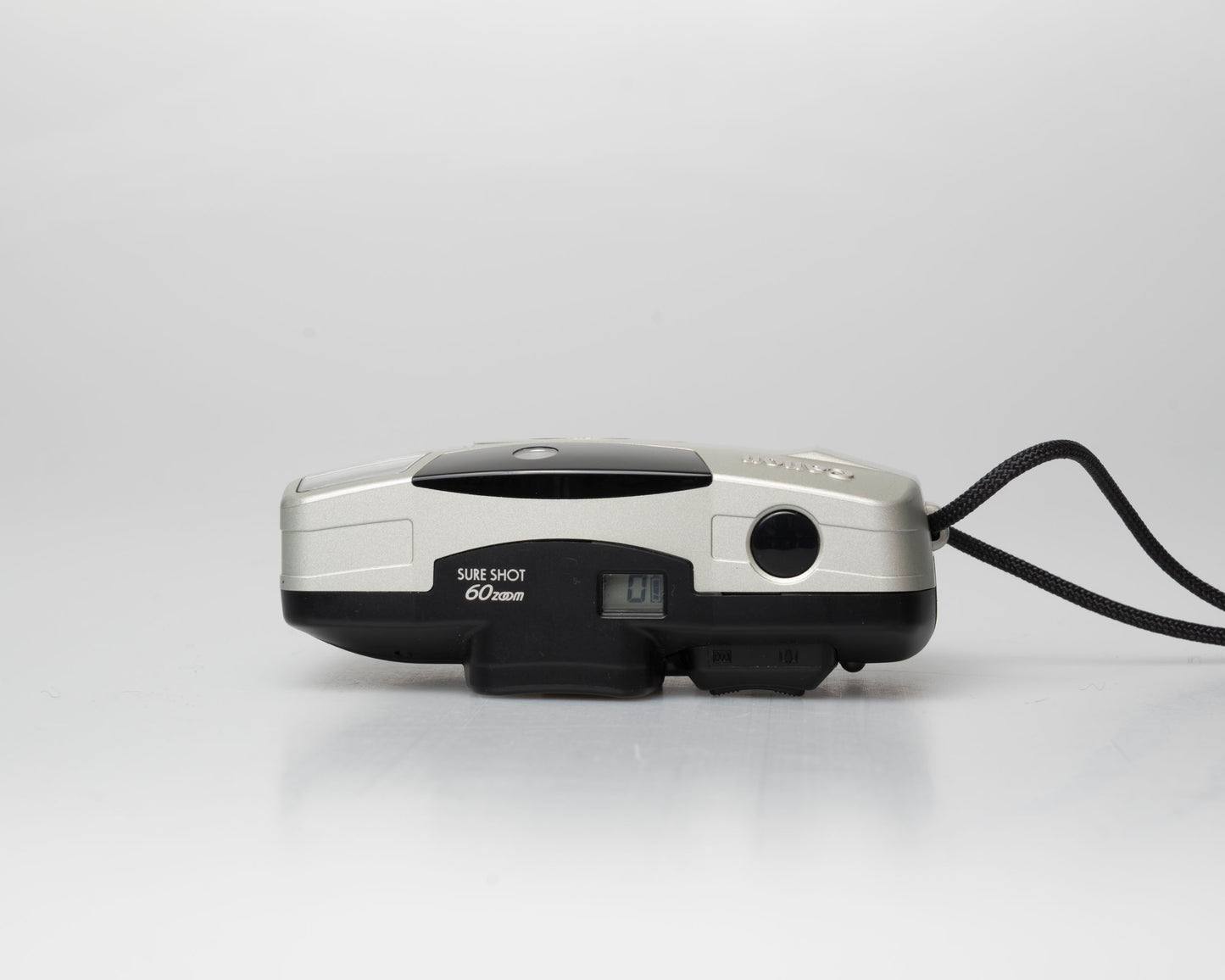 Canon Sure Shot 60 Zoom 35mm point-and-shoot camera; top view, off