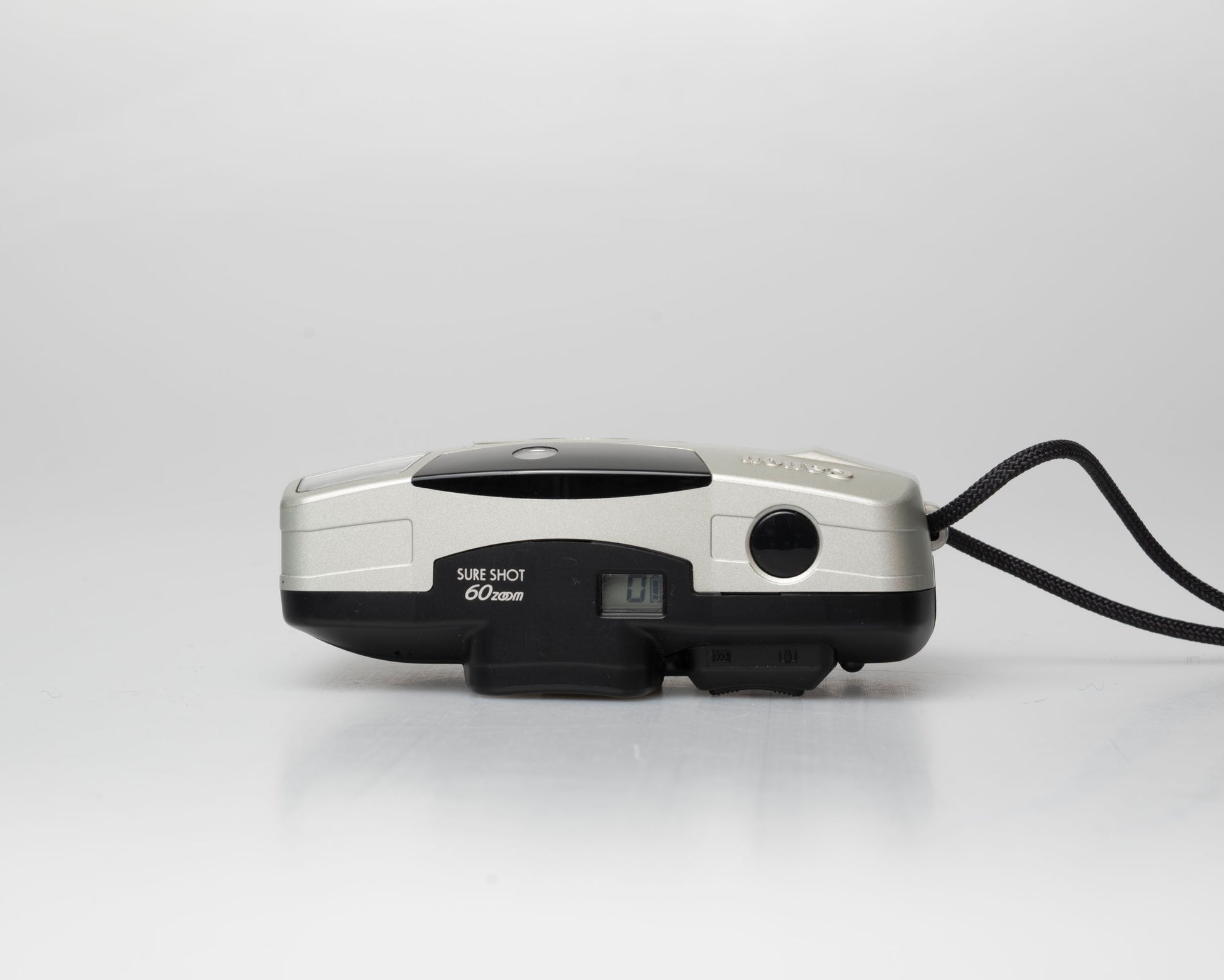 Canon Sure Shot 60 Zoom 35mm point-and-shoot camera; top view, off