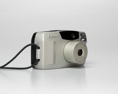 Canon Sure Shot 60 Zoom 35mm point-and-shoot camera; left angle zoomed out