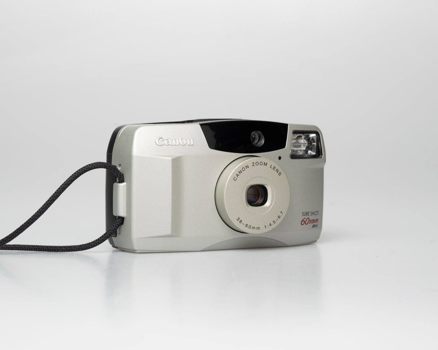 Canon Sure Shot 60 Zoom 35mm point-and-shoot camera; left angle