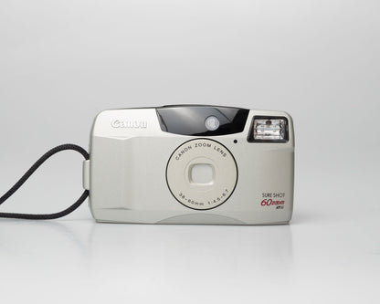 Canon Sure Shot 60 Zoom 35mm point-and-shoot camera; front view lens cover closed (off)