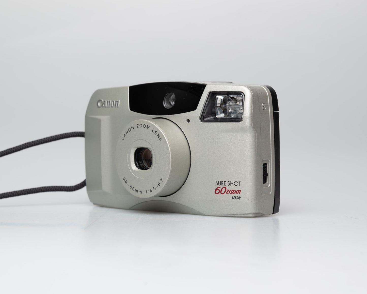 Canon Sure Shot 60 Zoom appareil photo argentique 35mm avec étui (numéro de série 4103382)