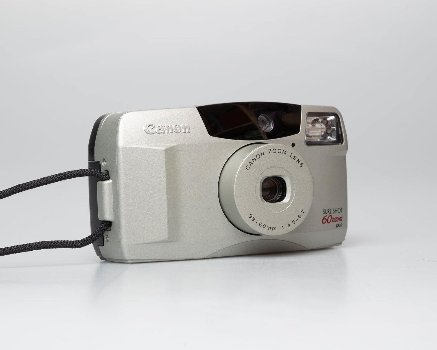 Canon Sure Shot 60 Zoom appareil photo argentique 35mm avec étui (numéro de série 4103382)