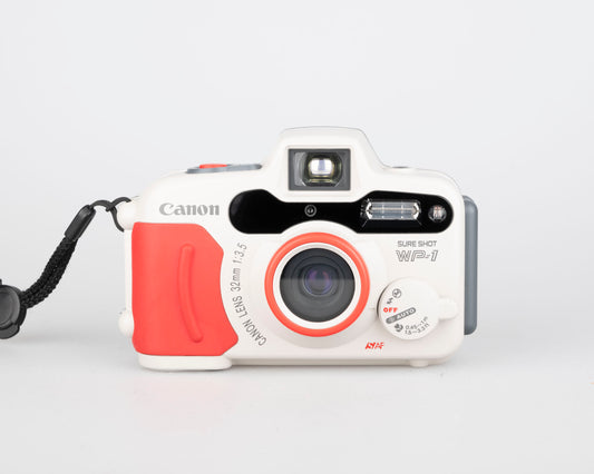 Canon Sure Shot WP-1 waterproof 35mm camera w/ case (serial 1119977)