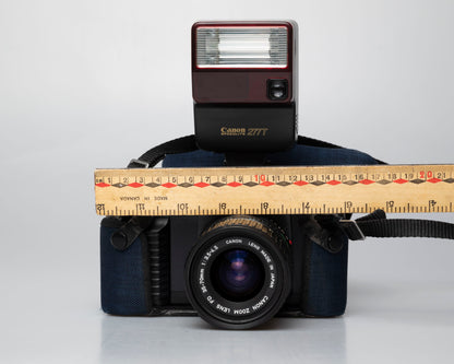 Canon T50 35mm film SLR camera w/ FD 35-70mm lens + Speedlite 277T flash + ever-ready case (serial 1061065)