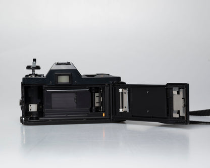 Canon T50 35mm film SLR camera w/ FD 35-70mm lens + Speedlite 277T flash + ever-ready case (serial 1061065)