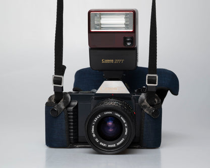 Canon T50 35mm film SLR camera w/ FD 35-70mm lens + Speedlite 277T flash + ever-ready case (serial 1061065)